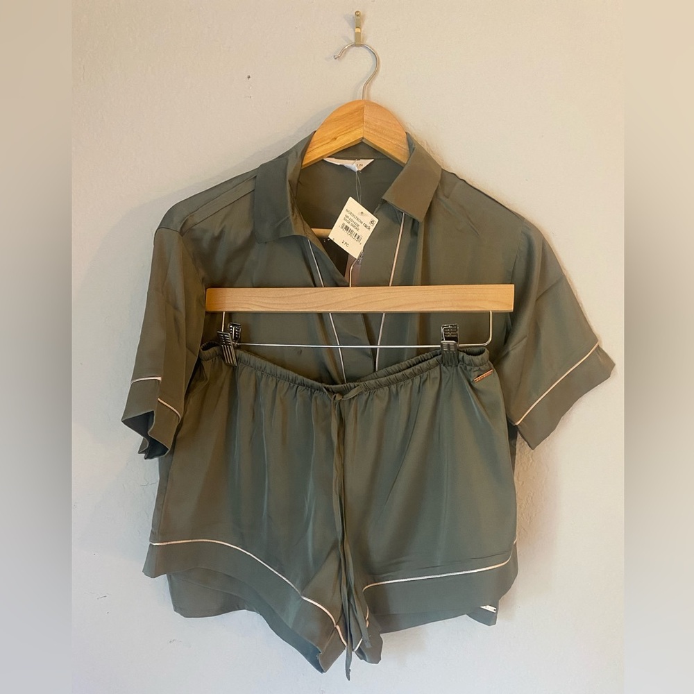 Pajama set, olive green sage color, Danskin, size small. Brand new never worn.